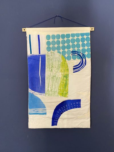 hand printed abstract wall hanging with aditional applique and embroidery