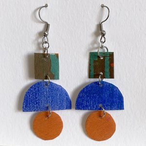 Earrings made up of colourful square, semi circle and circle.