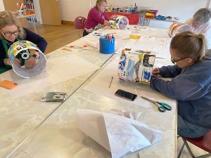 4 ladies constructing their lampshades