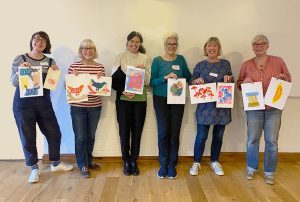 Smiling ladies with their prints