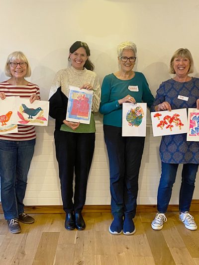 Smiling ladies with their prints