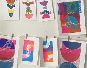 prints hanging in studio