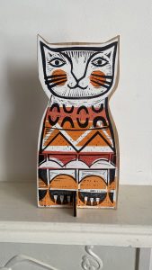 Ginger cat on shelf