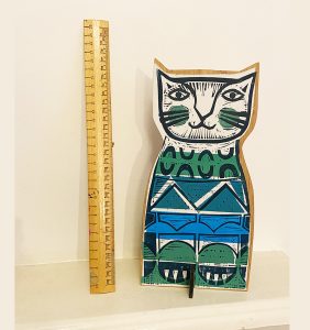 Clever Cat 1 with ruler showing height
