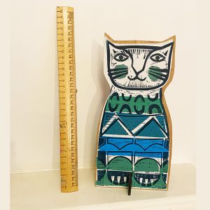 Clever Cat 1 with ruler showing height
